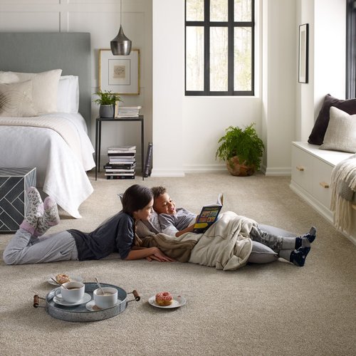 People on carpet in bedroom from Young's Interiors & Flooring in Ford City, PA