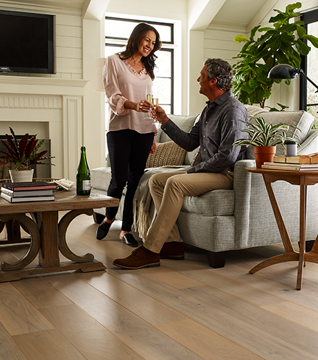 Couple sharing drinks from Young's Interiors & Flooring in Ford City